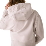 Lolë Yonder Full Zip Hoodie in Abalone pale greige — cropped and cozy, the Yonder Hoodie is your cold-weather comfort zone