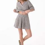 Lolë Bella Skirt in black stripe — an effortless cotton skirt with a relaxed, polished feel