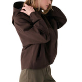 Lolë Alizé Rain Jacket in Java dark brown — fit note: Designed with a relaxed, oversized fit