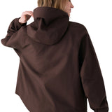 Lolë Alizé Rain Jacket in Java dark brown — fit note: Designed with a relaxed, oversized fit