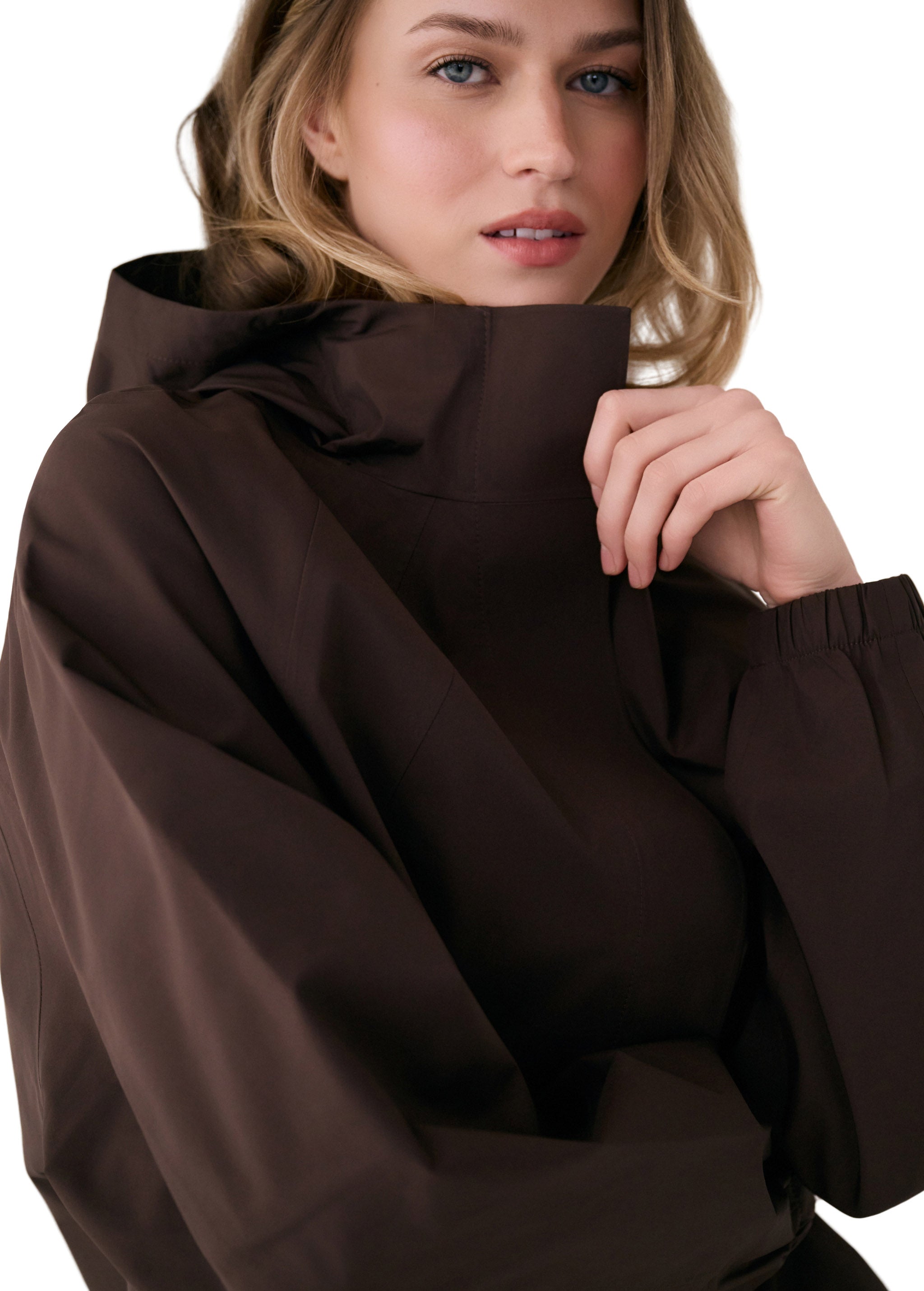 Lolë Alizé Rain Jacket in Java dark brown — fit note: Designed with a relaxed, oversized fit