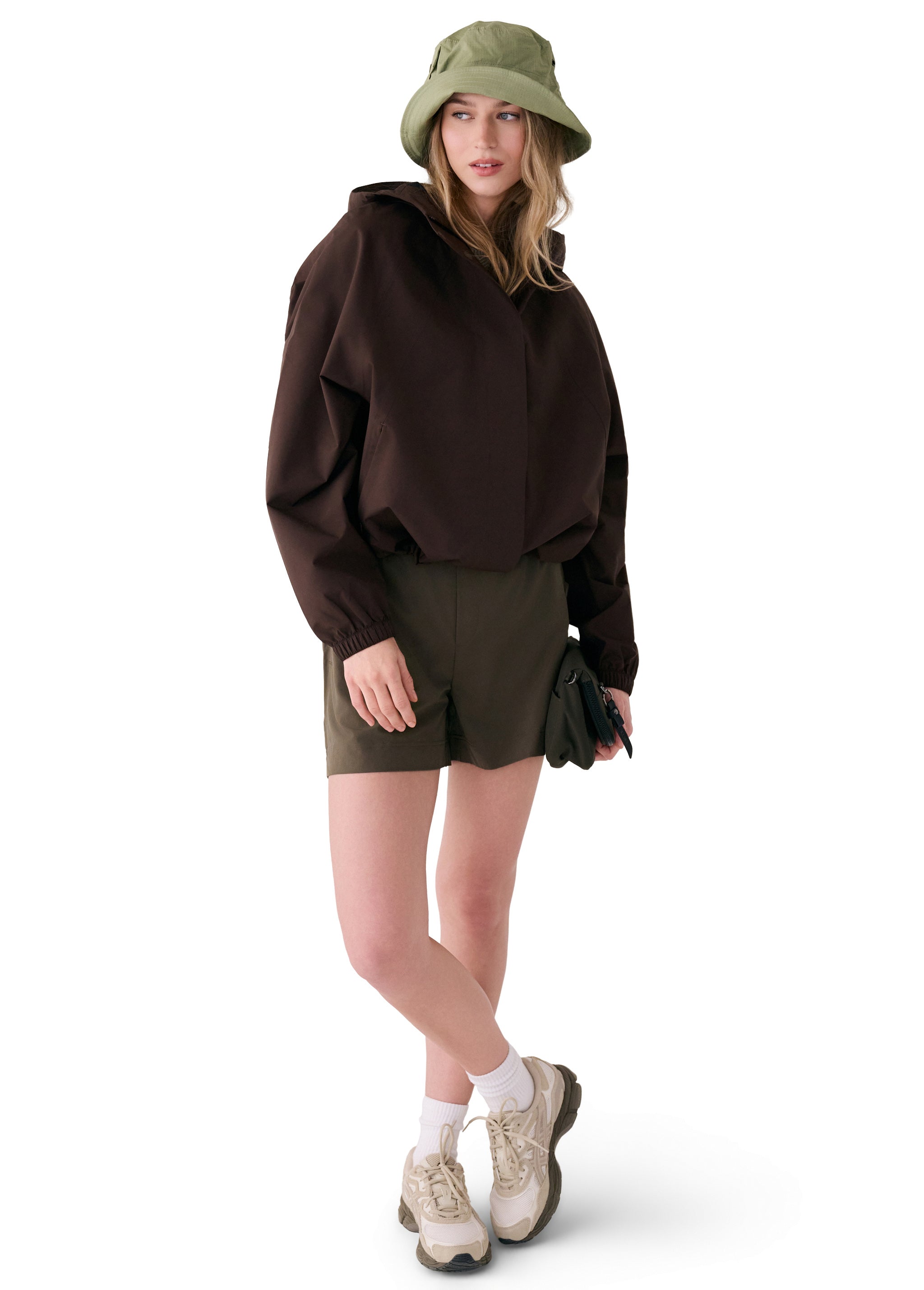 Lolë Alizé Rain Jacket in Java dark brown — fit note: Designed with a relaxed, oversized fit