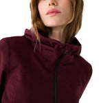 Lolë Element 2 Rain Jacket in burgundy — the Element 2 Rain Jacket is fully seam-sealed to keep moisture out
