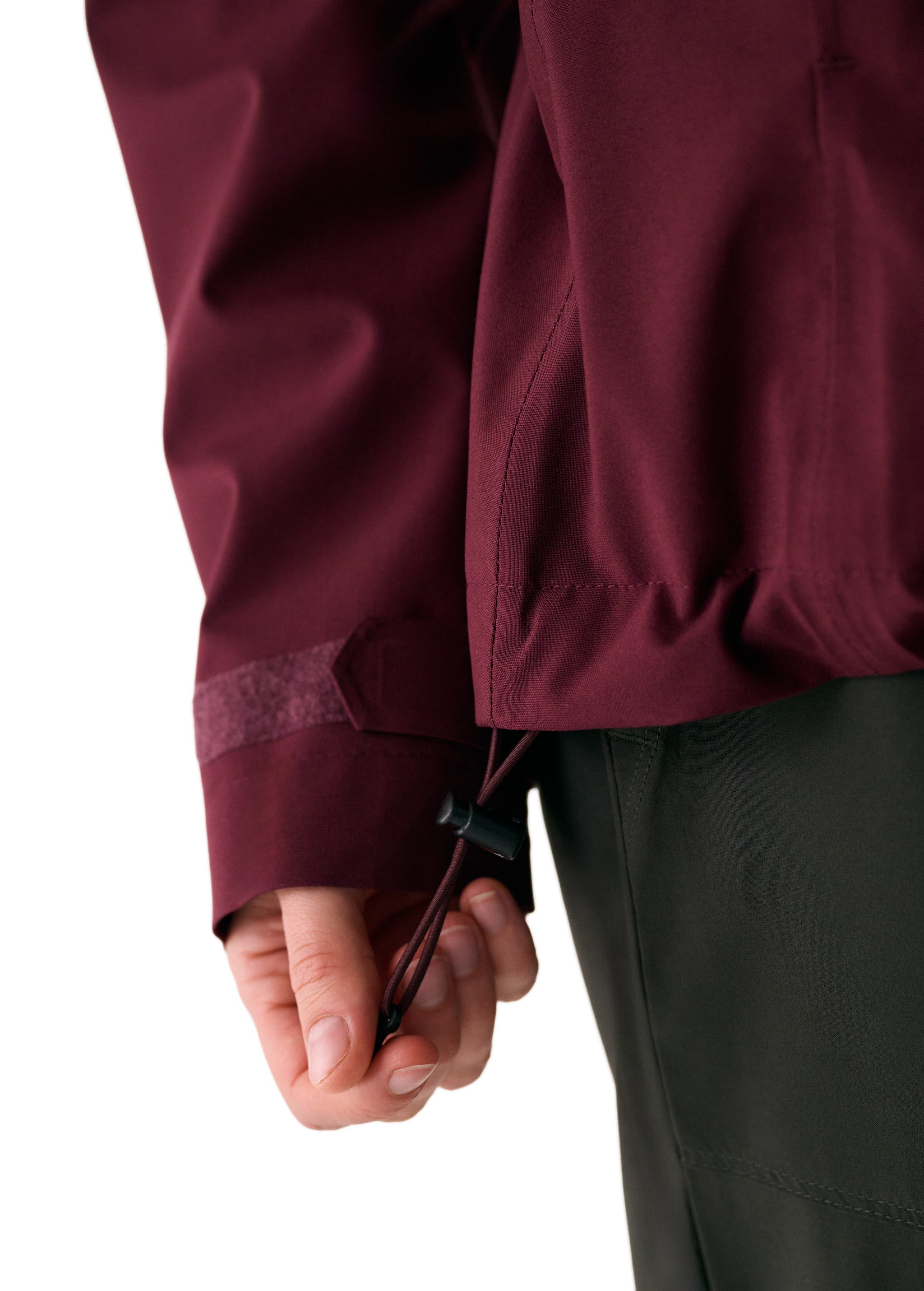 Lolë Element 2 Rain Jacket in burgundy — the Element 2 Rain Jacket is fully seam-sealed to keep moisture out