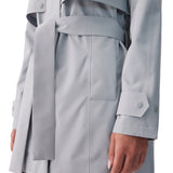 Lolë Alizé Short Trench Coat in Steel light grey — fit note: Cut with a relaxed fit for comfortable layering