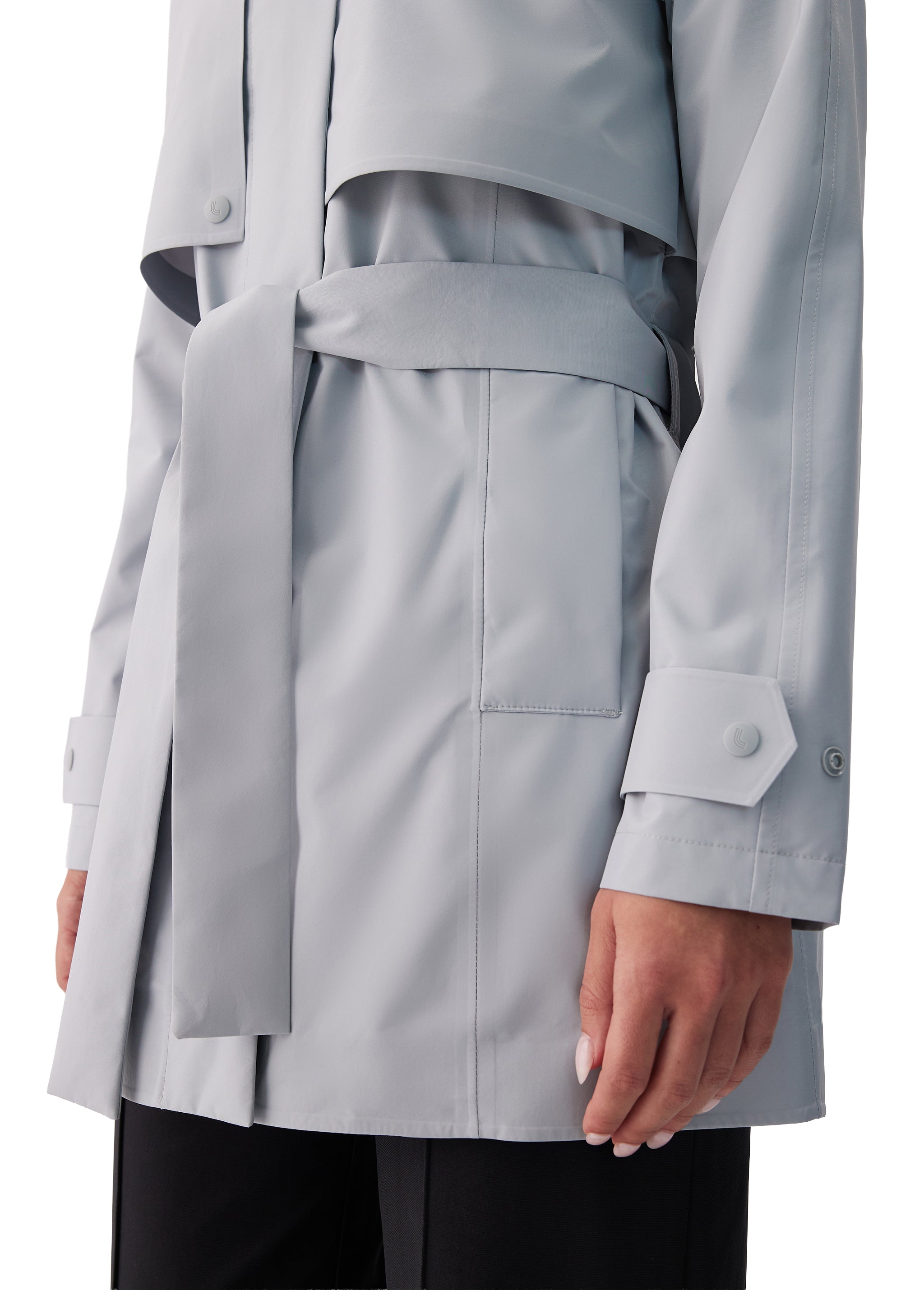 Lolë Alizé Short Trench Coat in Steel light grey — fit note: Cut with a relaxed fit for comfortable layering