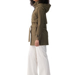 Lolë Alizé Short Trench Coat in Moss olive green — fit note: Cut with a relaxed fit for comfortable layering