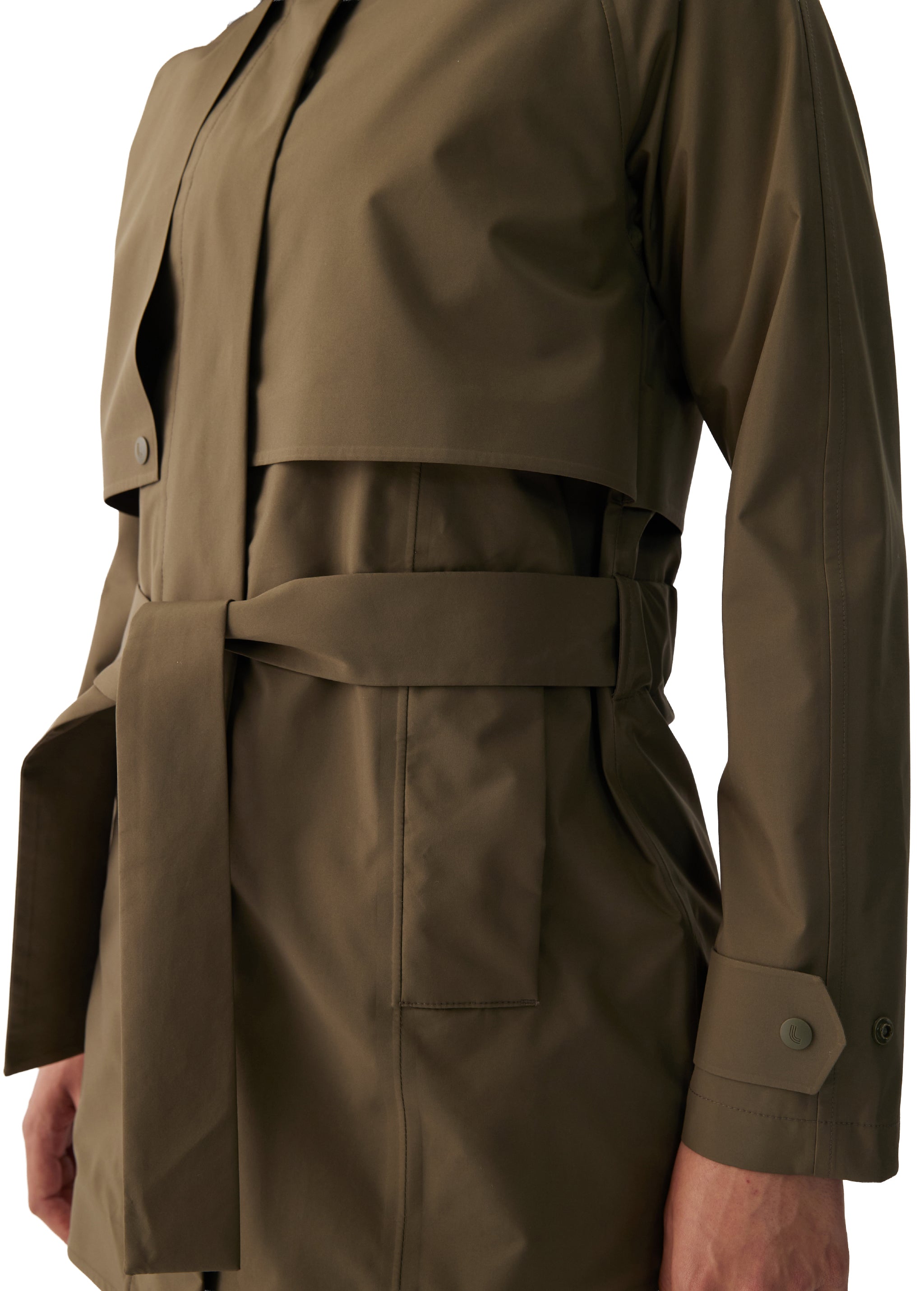 Lolë Alizé Short Trench Coat in Moss olive green — fit note: Cut with a relaxed fit for comfortable layering