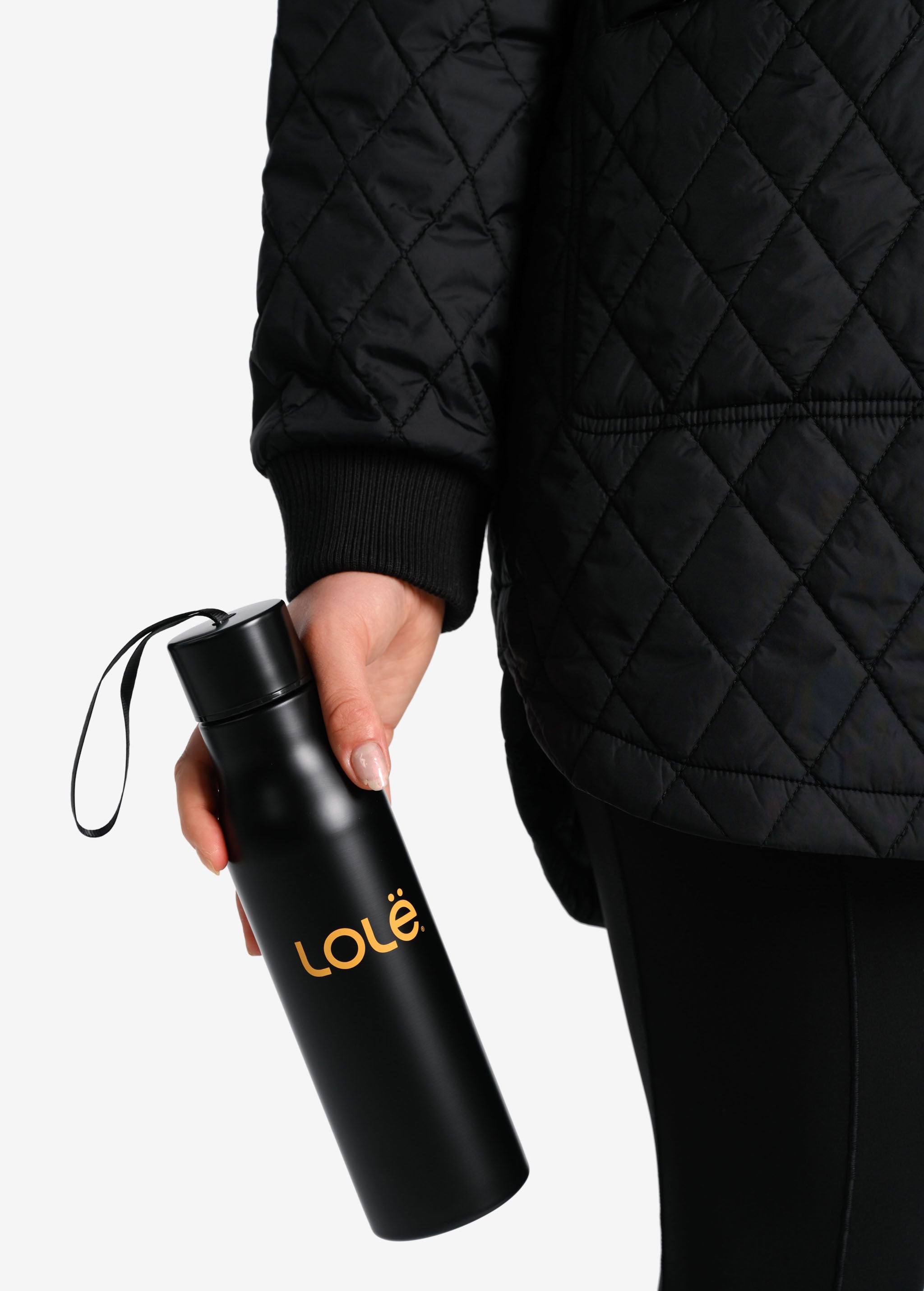 Lolë Refresh Water Bottle in black — features a wristlet strap for easy on-the-go hydration
