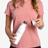 Lolë Refresh Water Bottle in white — features a wristlet strap for easy on-the-go hydration