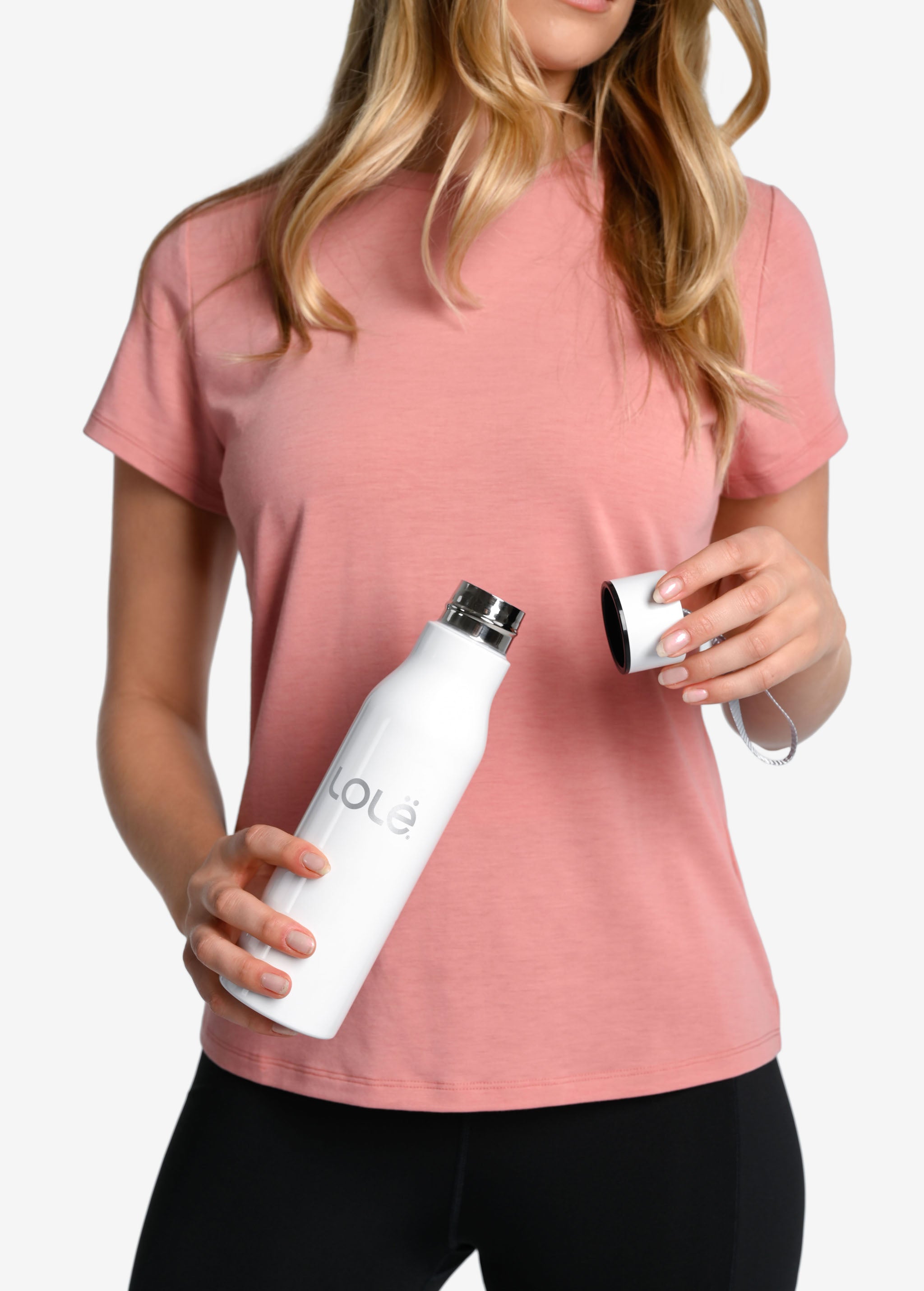 Lolë Refresh Water Bottle in white — features a wristlet strap for easy on-the-go hydration