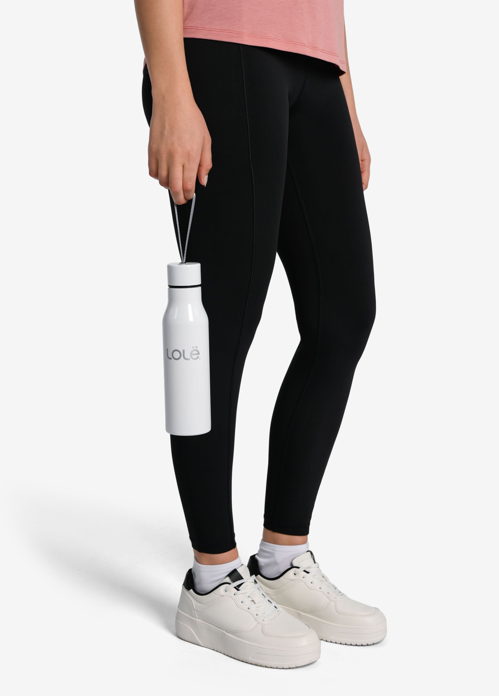 Lolë Refresh Water Bottle in white — features a wristlet strap for easy on-the-go hydration