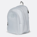 Lolë Chelsea backpack in pale grey, angled front product shot highlighting the rounded shape and side pocket