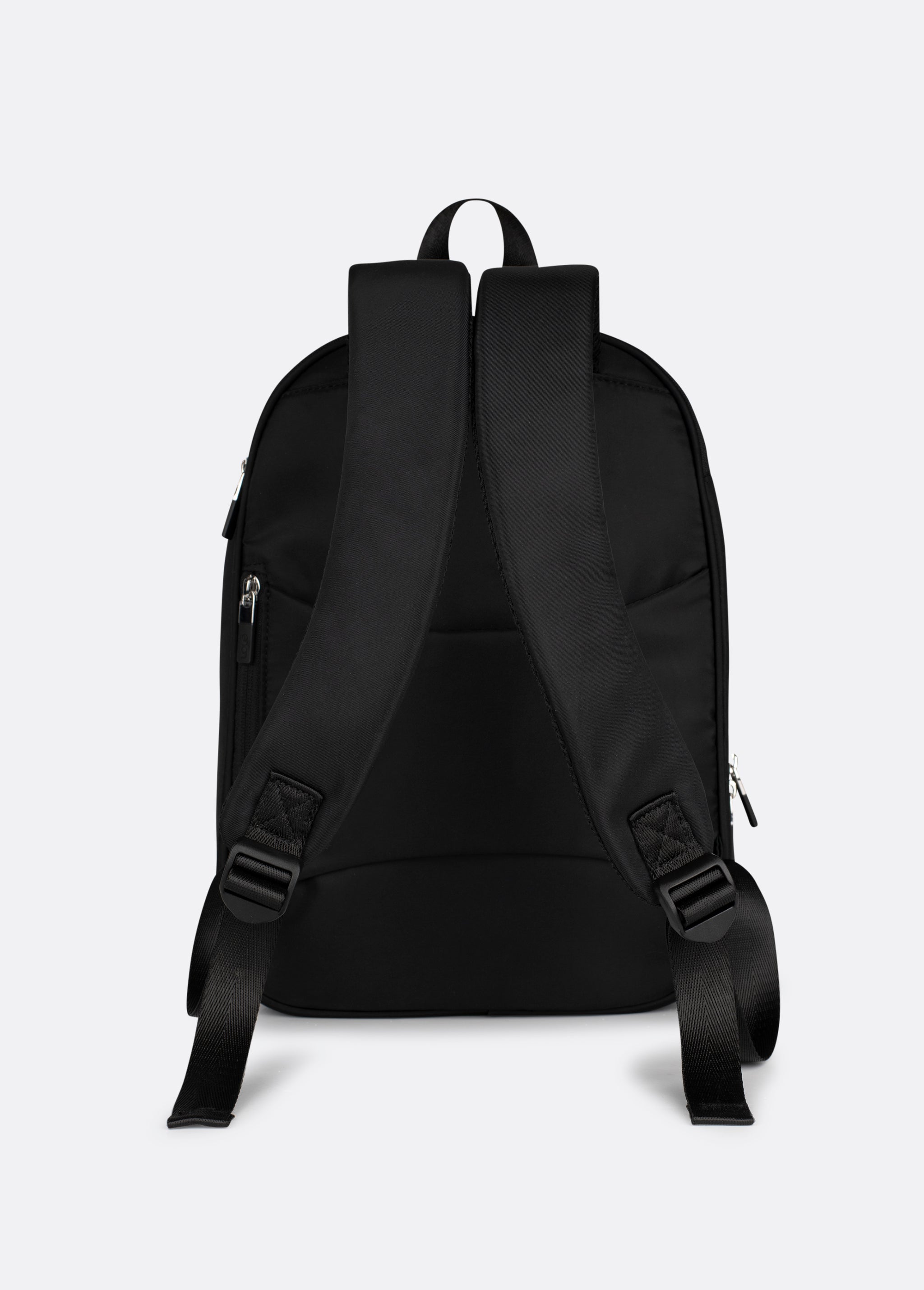 Lolë Chelsea backpack in black, rear product view of the padded shoulder straps and adjustable webbing