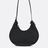 Lolë Mini Hobo Bag in black — consider this sleek bag elevated, inside and out