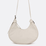 Lolë Mini Hobo Bag in Birch cream — consider this sleek bag elevated, inside and out