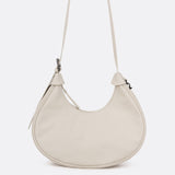Lolë Mini Hobo Bag in Birch cream — consider this sleek bag elevated, inside and out