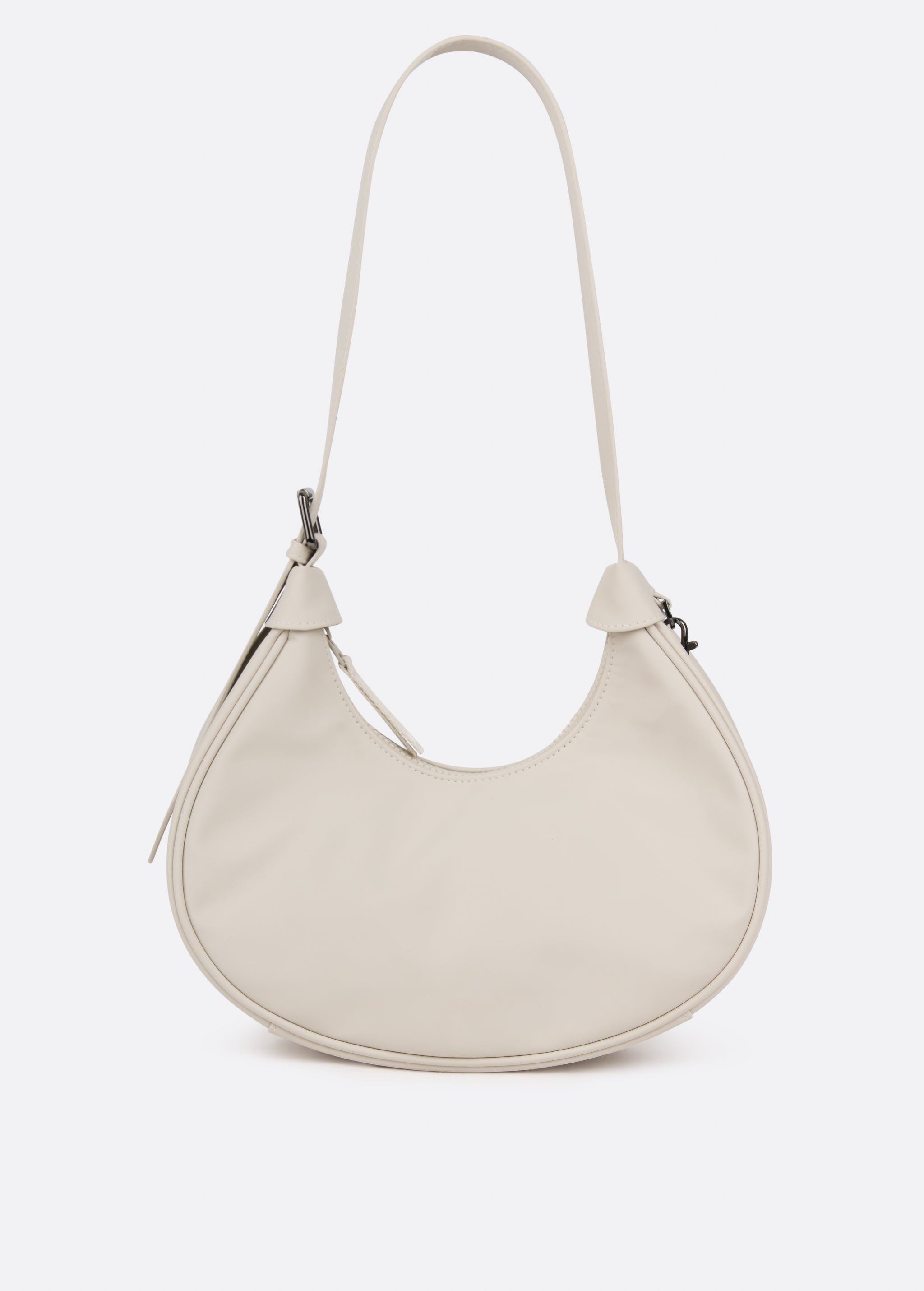 Lolë Mini Hobo Bag in Birch cream — consider this sleek bag elevated, inside and out