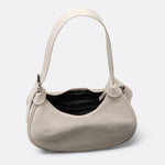 Lolë Mini Hobo Bag in Birch cream — consider this sleek bag elevated, inside and out
