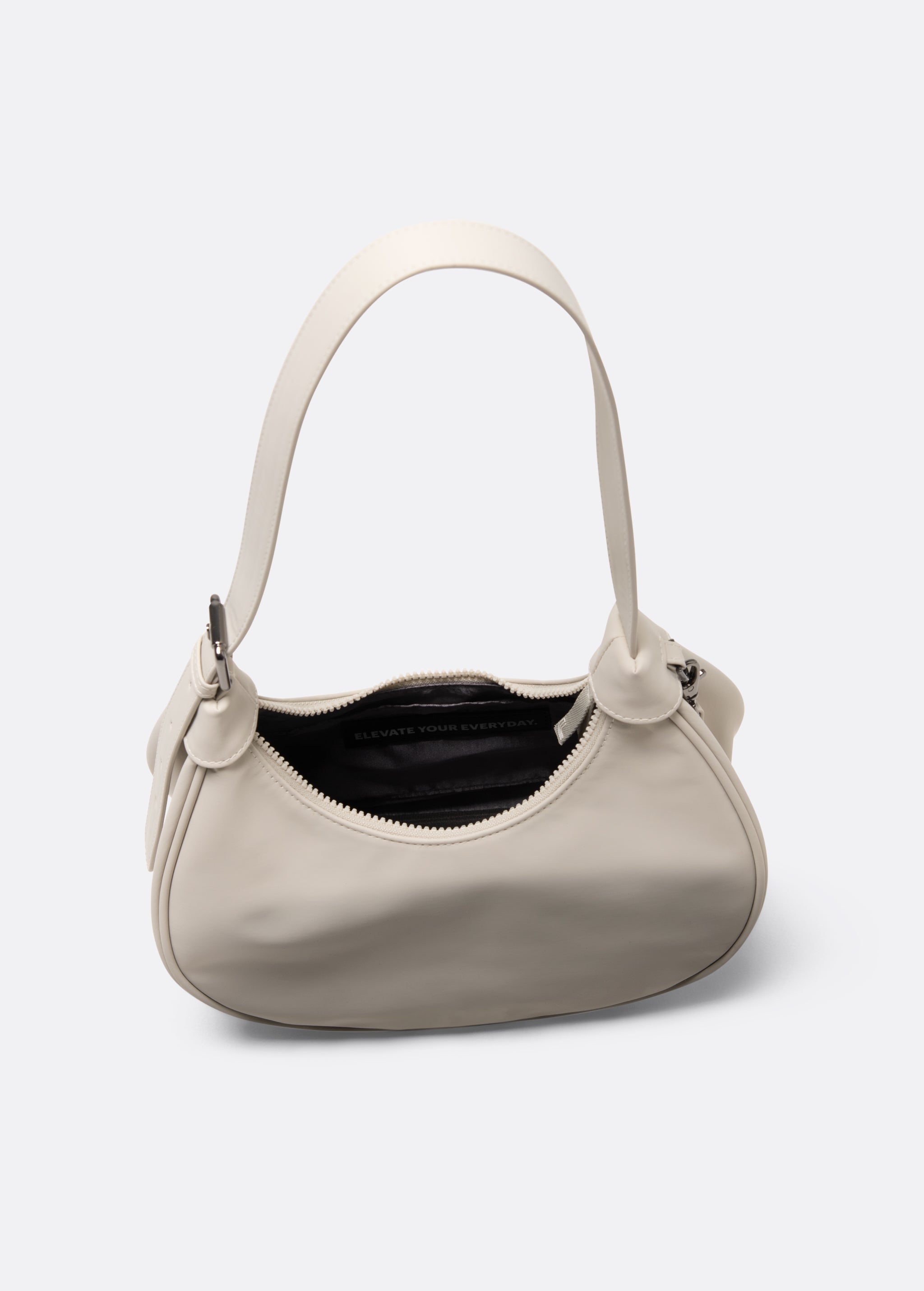 Lolë Mini Hobo Bag in Birch cream — consider this sleek bag elevated, inside and out