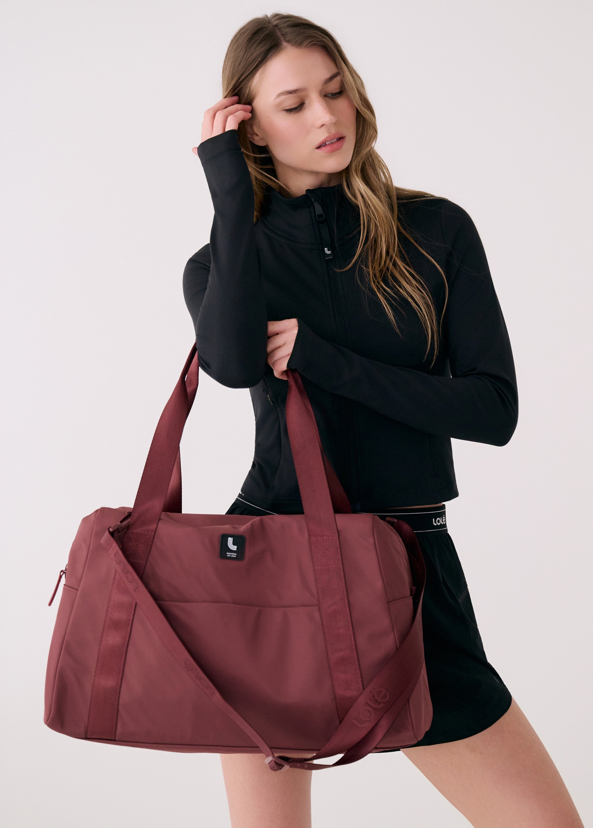 Lolë Westmount Duffle Gym Bag in Mauveberry dusty rose — gym bag energy, minus the gym-only look