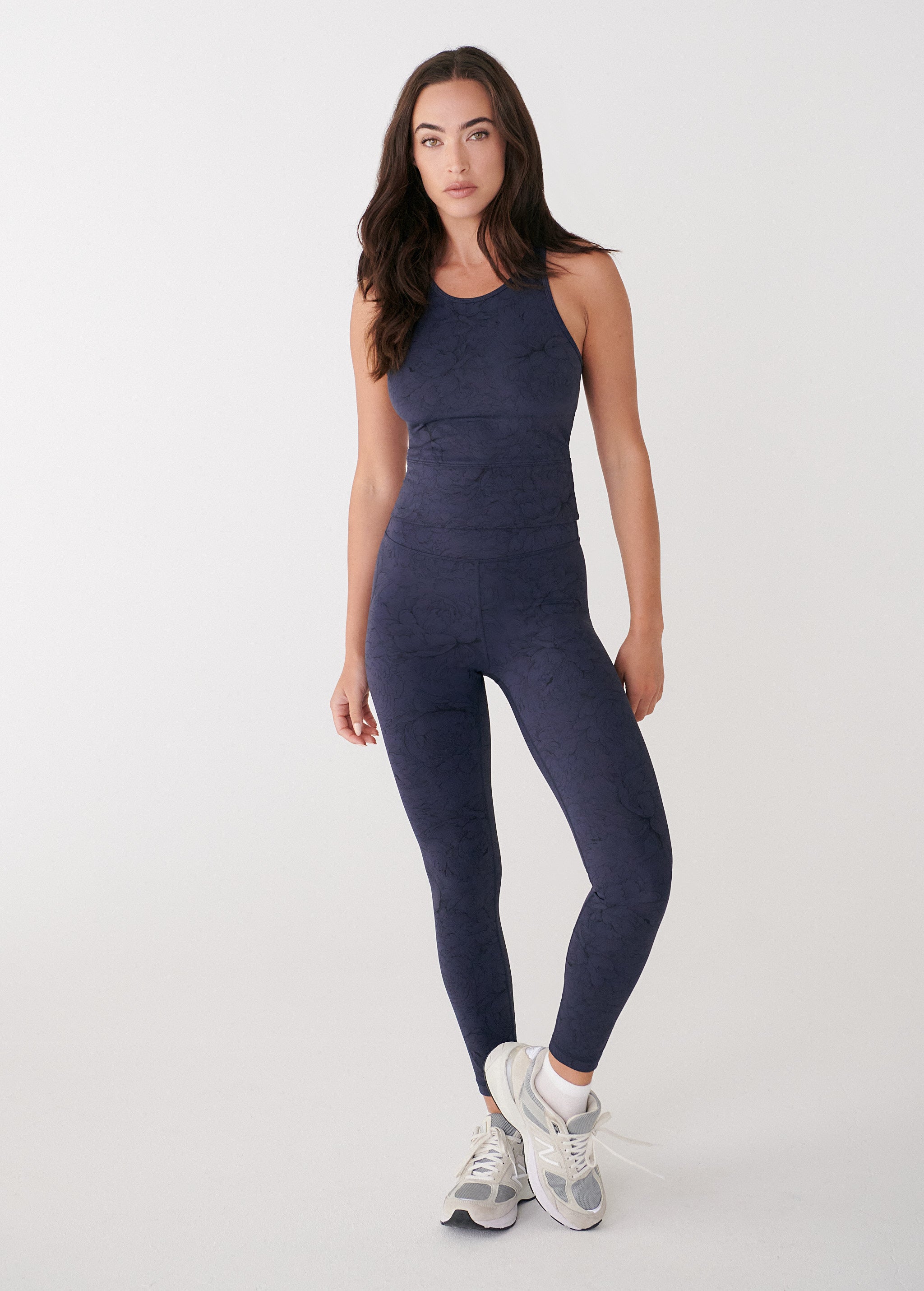 Lolë Serene Ankle Leggings in navy floral print — pair it with a Serene tank or bra to complete the set