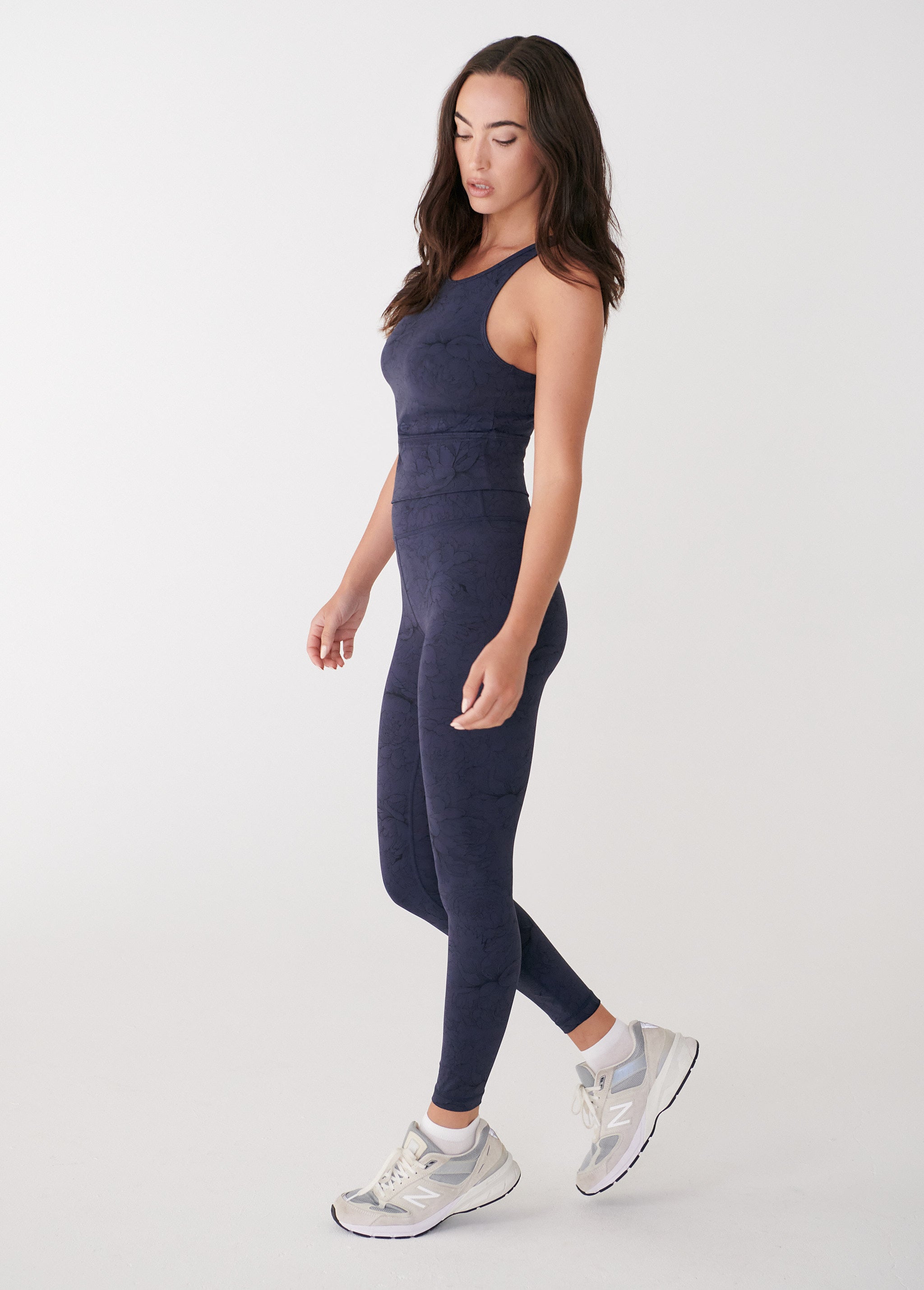 Lolë Serene Ankle Leggings in navy floral print — pair it with a Serene tank or bra to complete the set