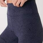 Lolë Serene Ankle Leggings in navy floral print — pair it with a Serene tank or bra to complete the set