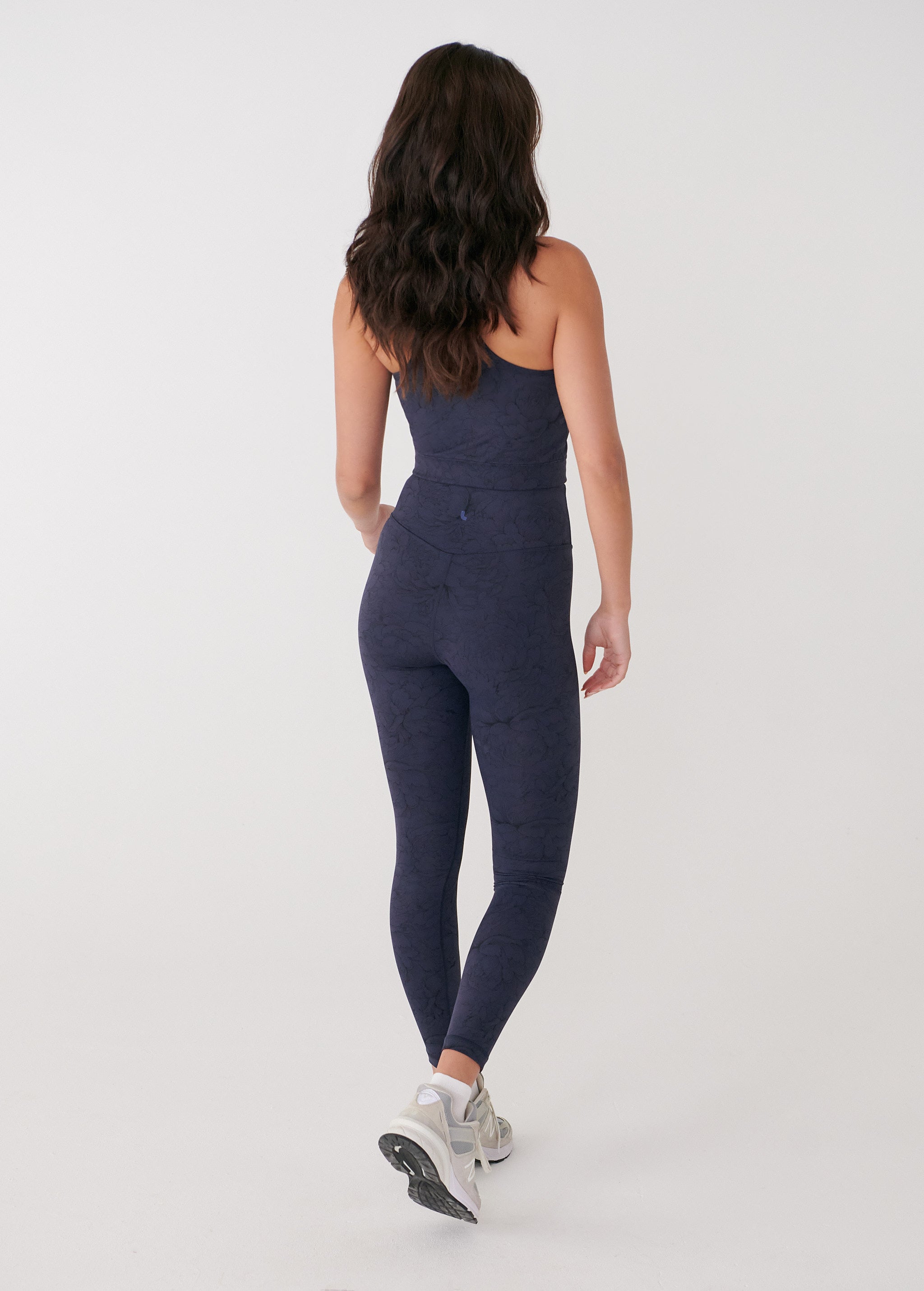 Lolë Serene Ankle Leggings in navy floral print — pair it with a Serene tank or bra to complete the set