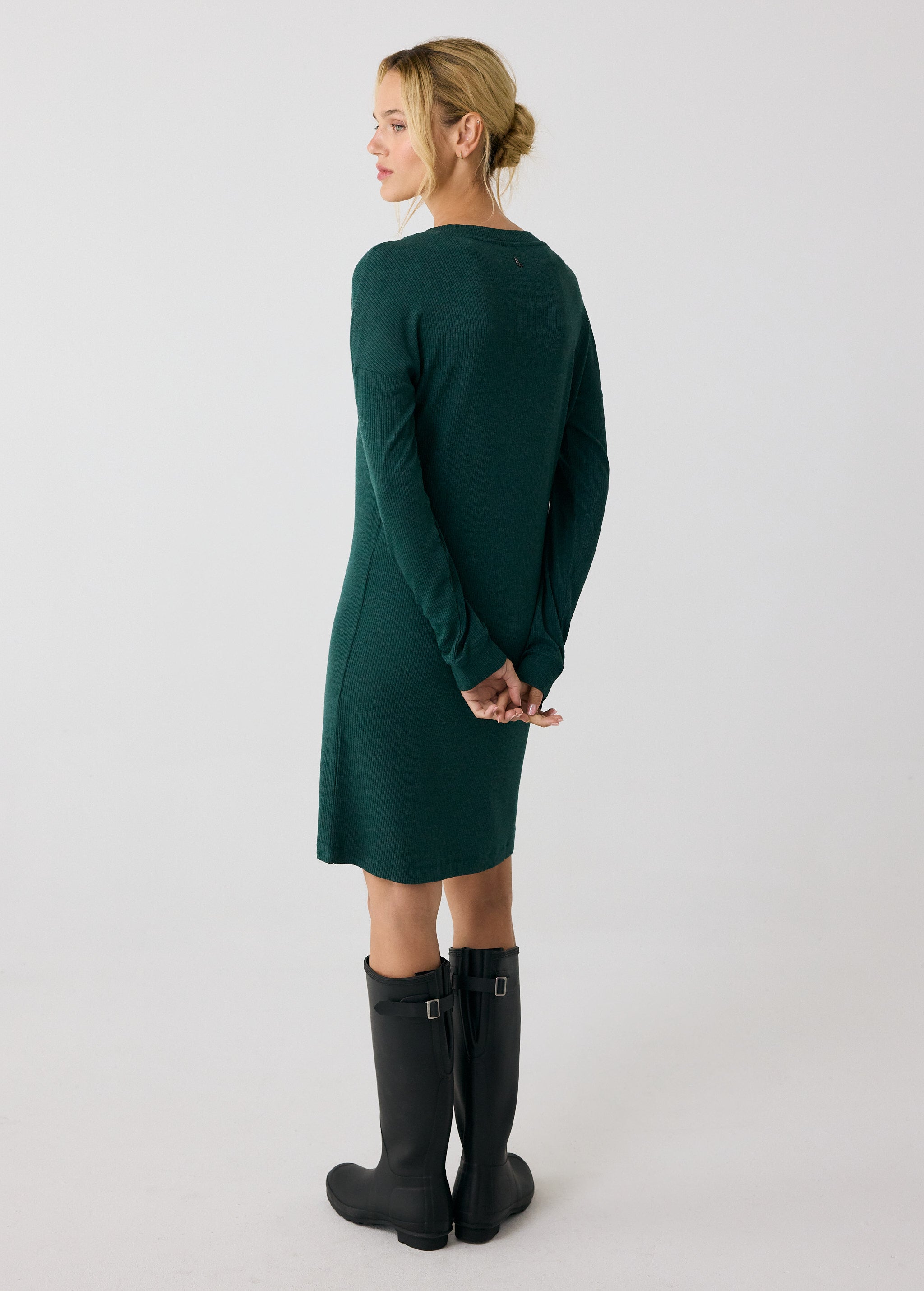 Lolë Traverse V-Neck Dress in dark green — this fully styled v-neck dress is your go-to when dressing up