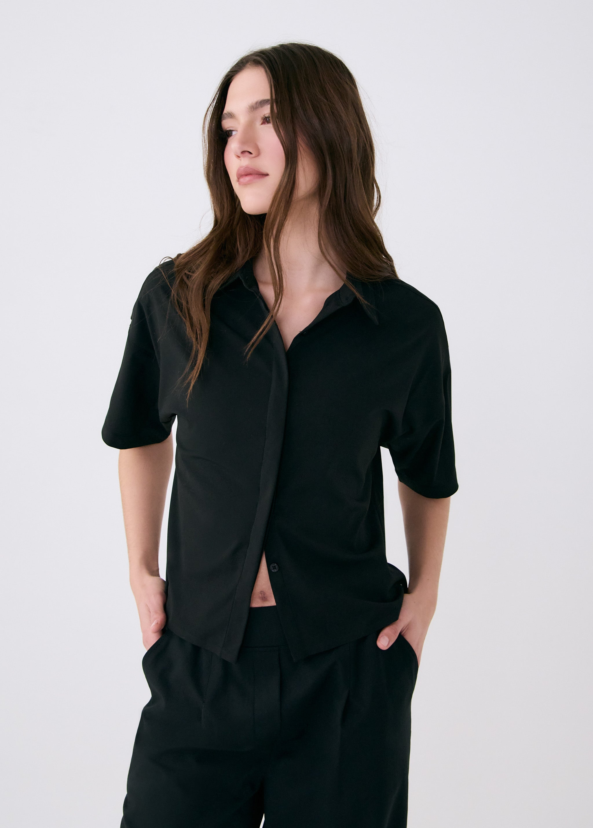 Lolë Olivie Button Up Shirt in black — button up in style with this lightweight, breathable shirt