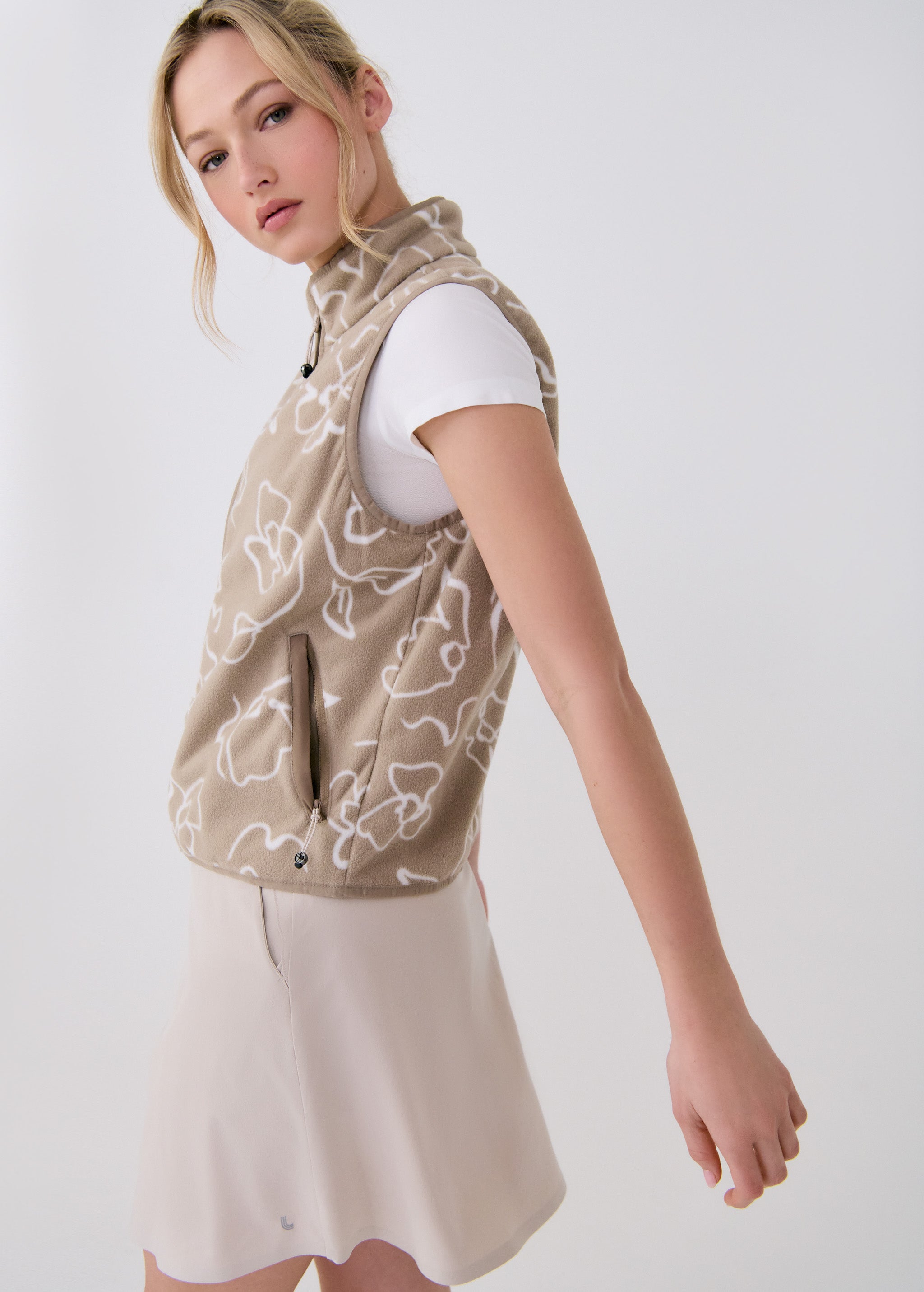 Lolë Aura Vest in beige floral print