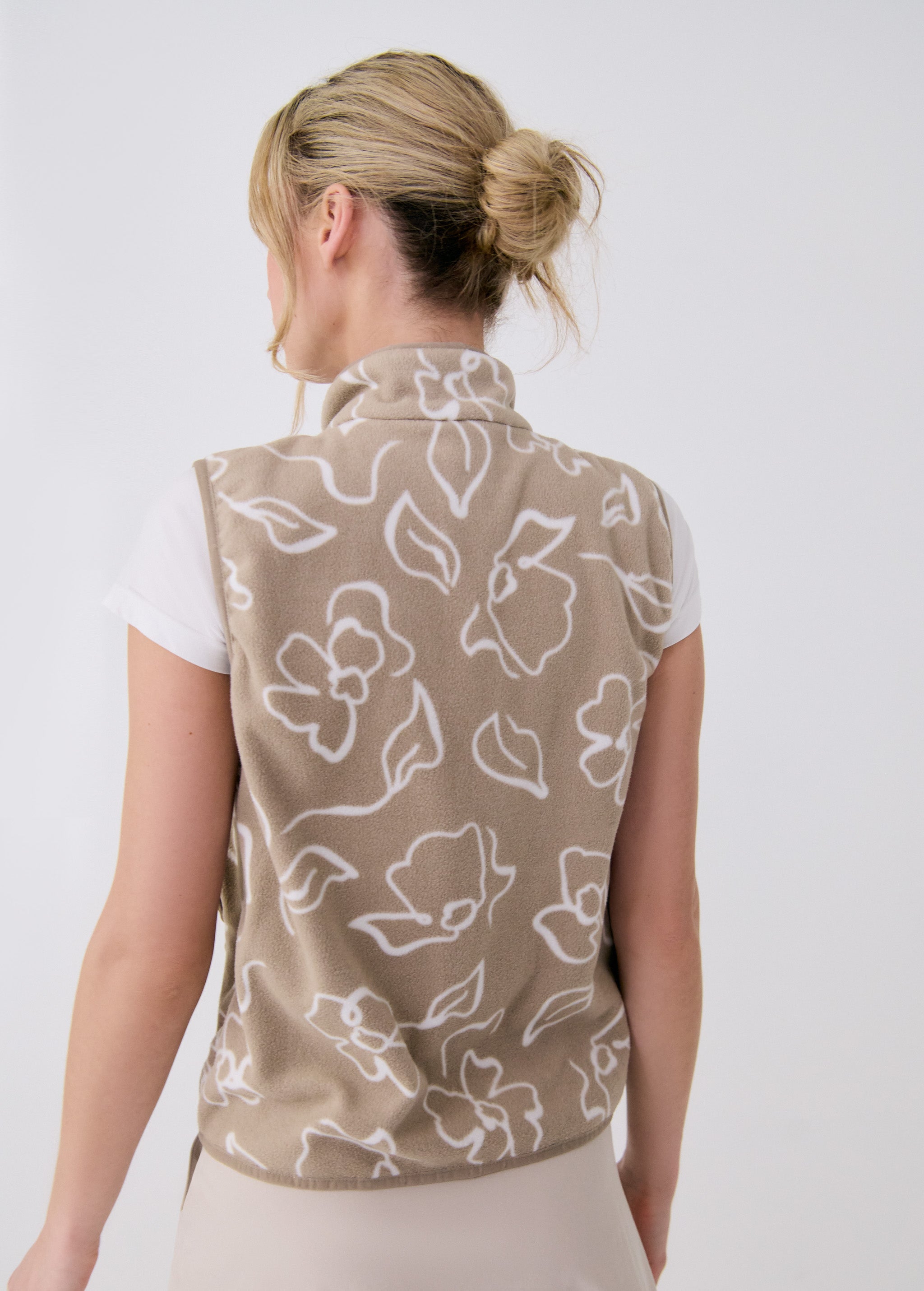 Lolë Aura Vest in beige floral print