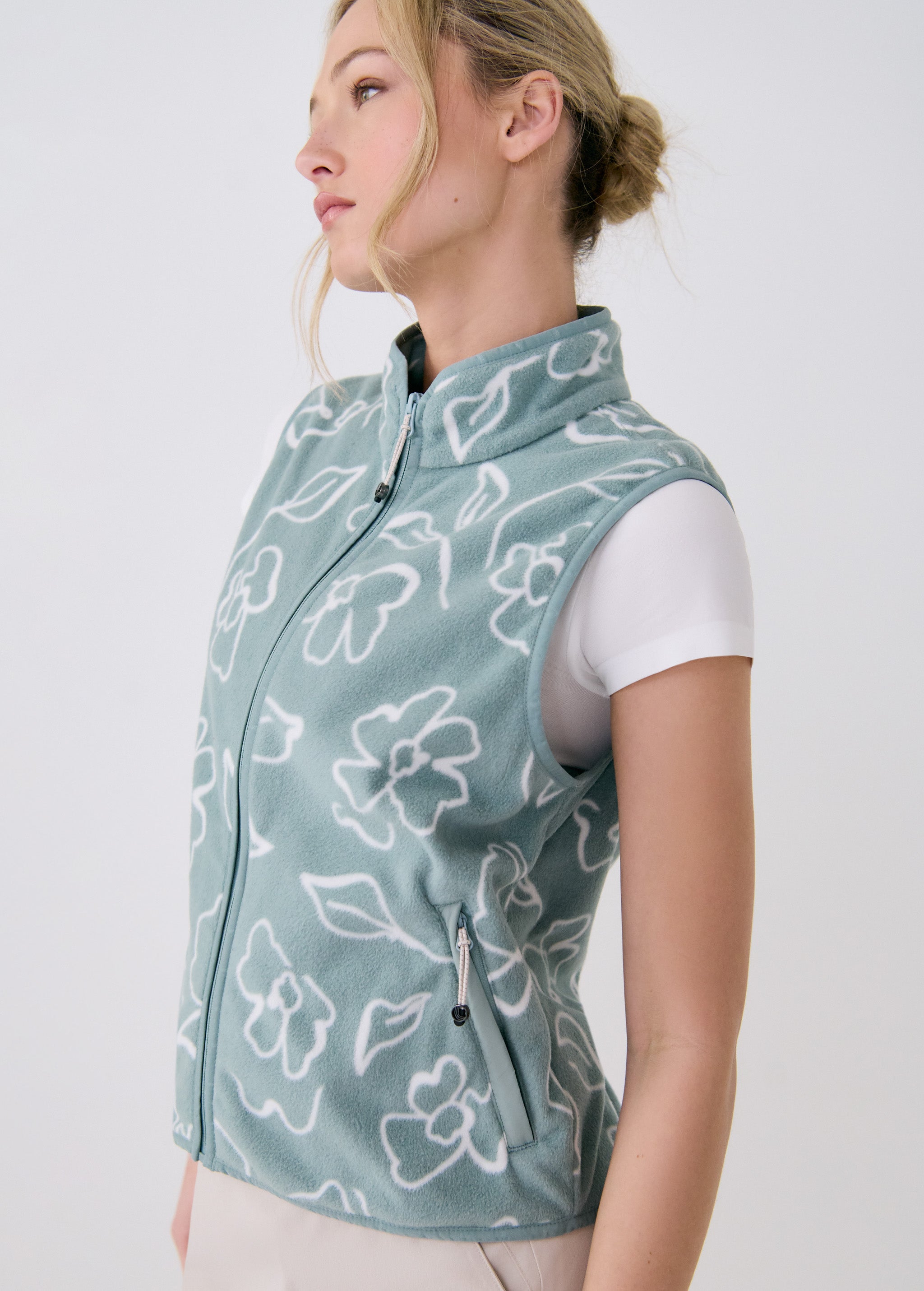 Lolë Aura Vest in sage green floral print