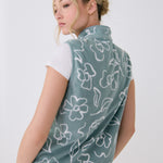 Lolë Aura Vest in sage green floral print