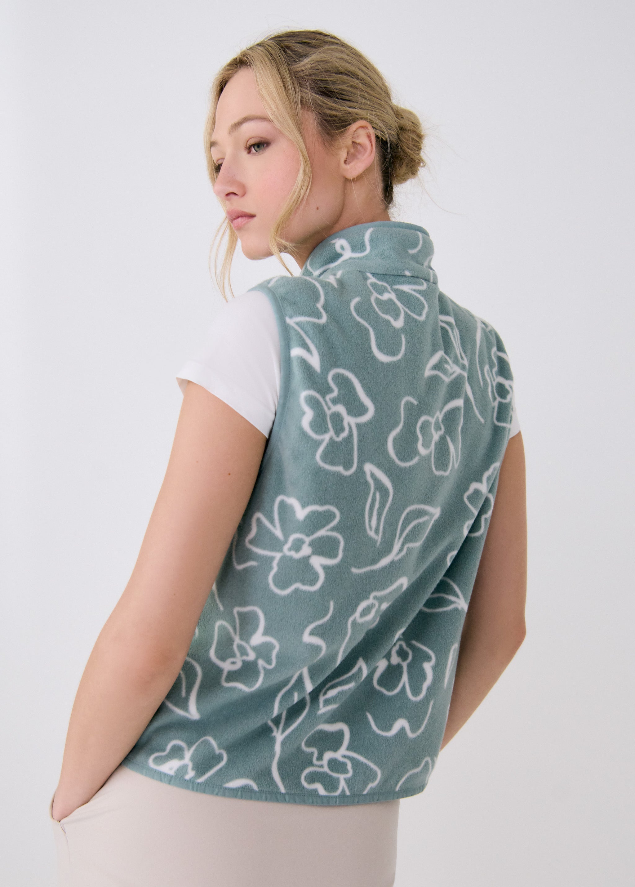 Lolë Aura Vest in sage green floral print