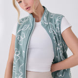 Lolë Aura Vest in sage green floral print