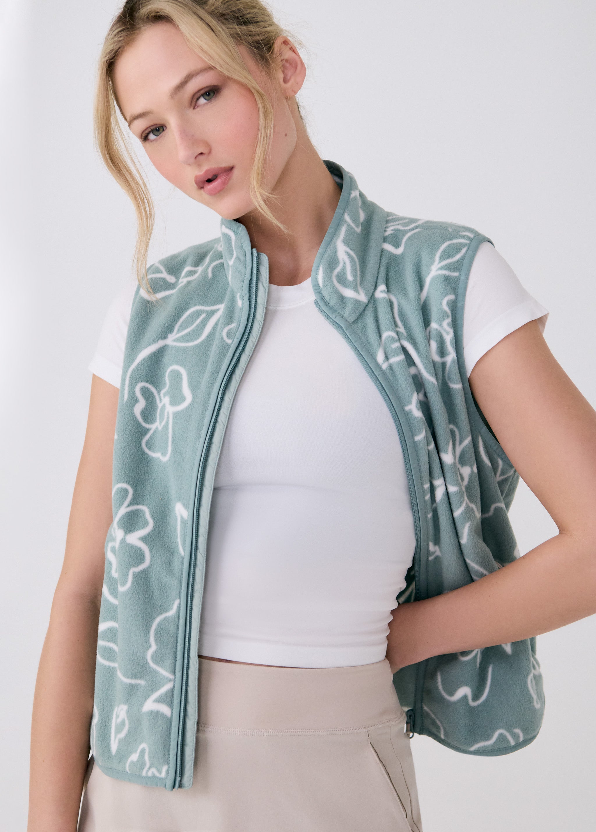 Lolë Aura Vest in sage green floral print