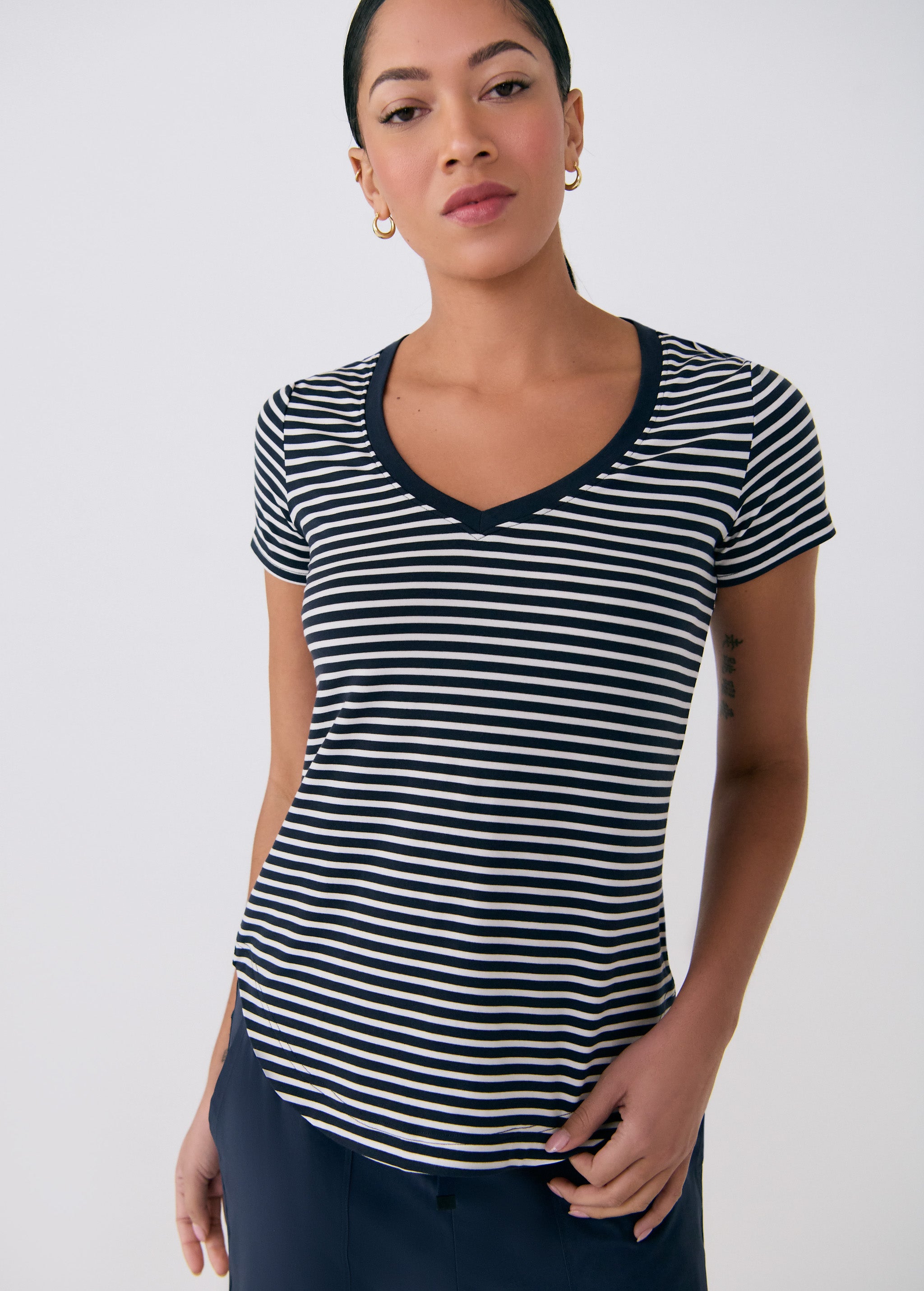 Lolë Dynamic V-neck in navy stripe — this V-neck tee proves that everyday essentials can still feel special