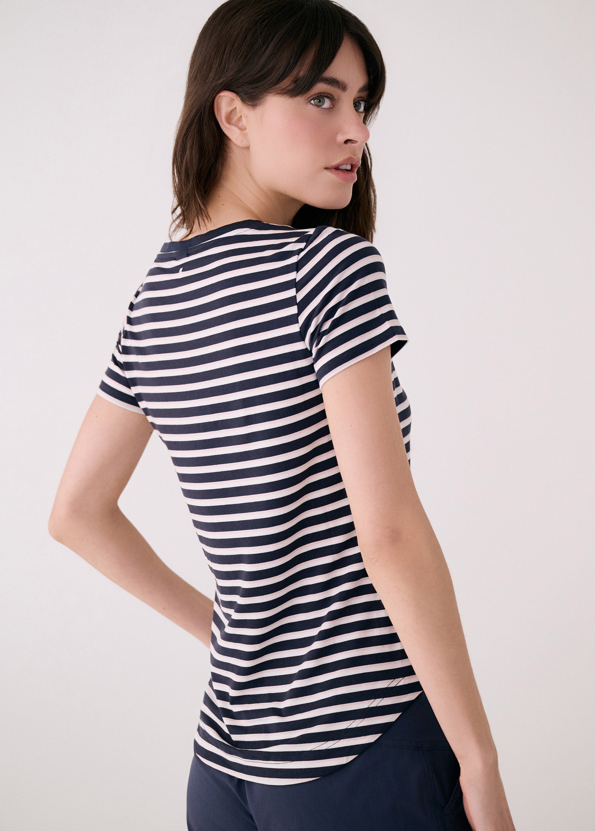 Lolë Dynamic V-neck in navy stripe — this V-neck tee proves that everyday essentials can still feel special