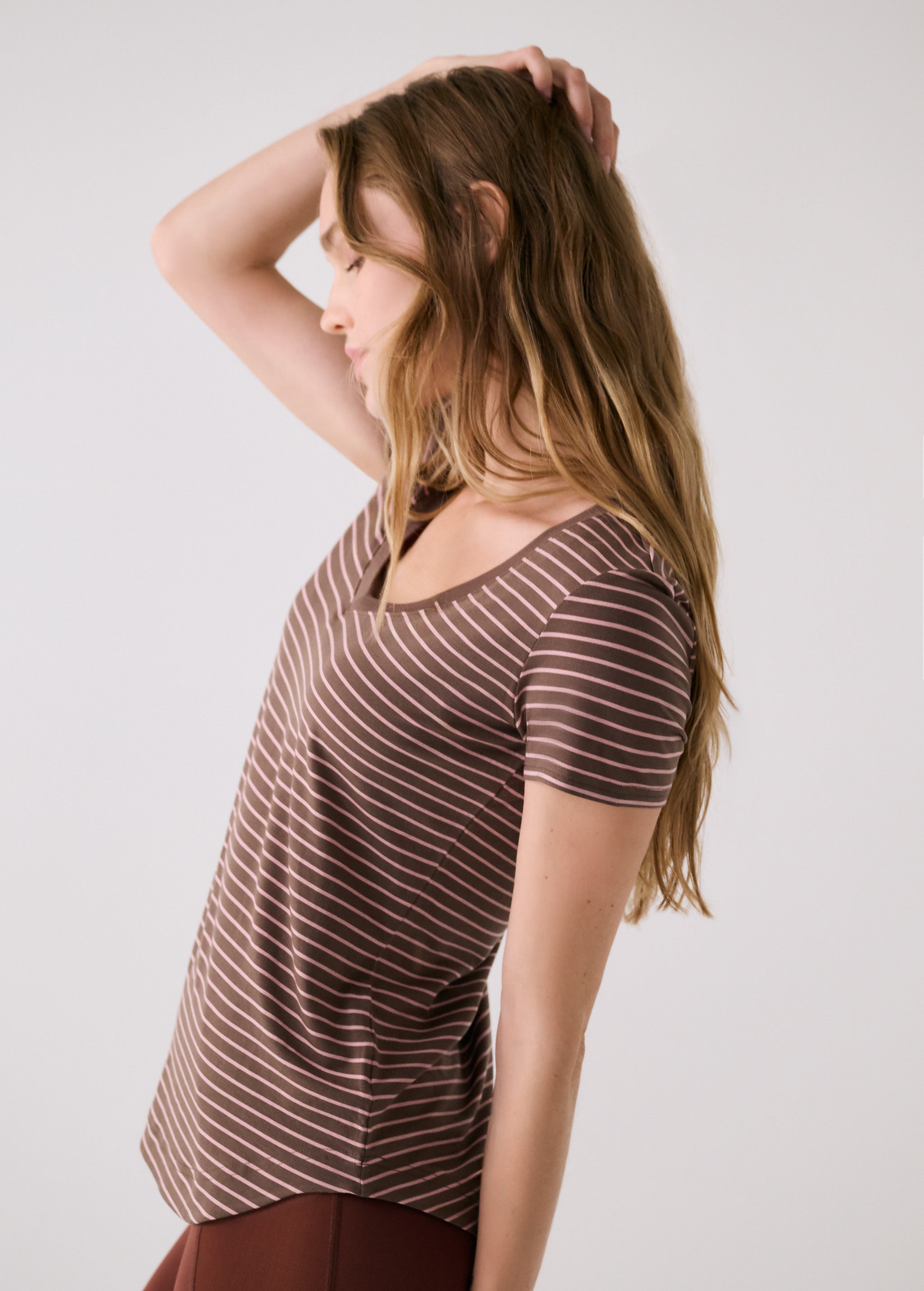 Lolë Dynamic V-neck in brown stripe — this V-neck tee proves that everyday essentials can still feel special