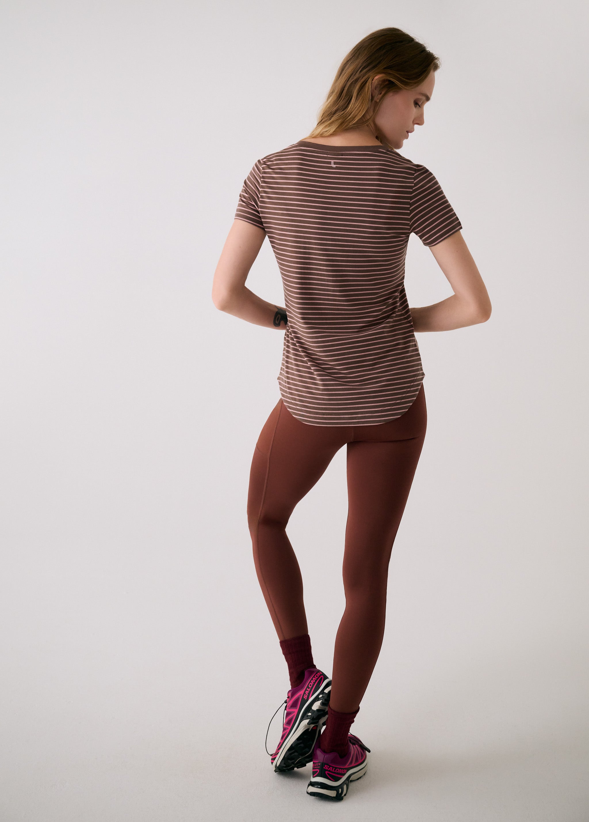 Lolë Dynamic V-neck in brown stripe — this V-neck tee proves that everyday essentials can still feel special