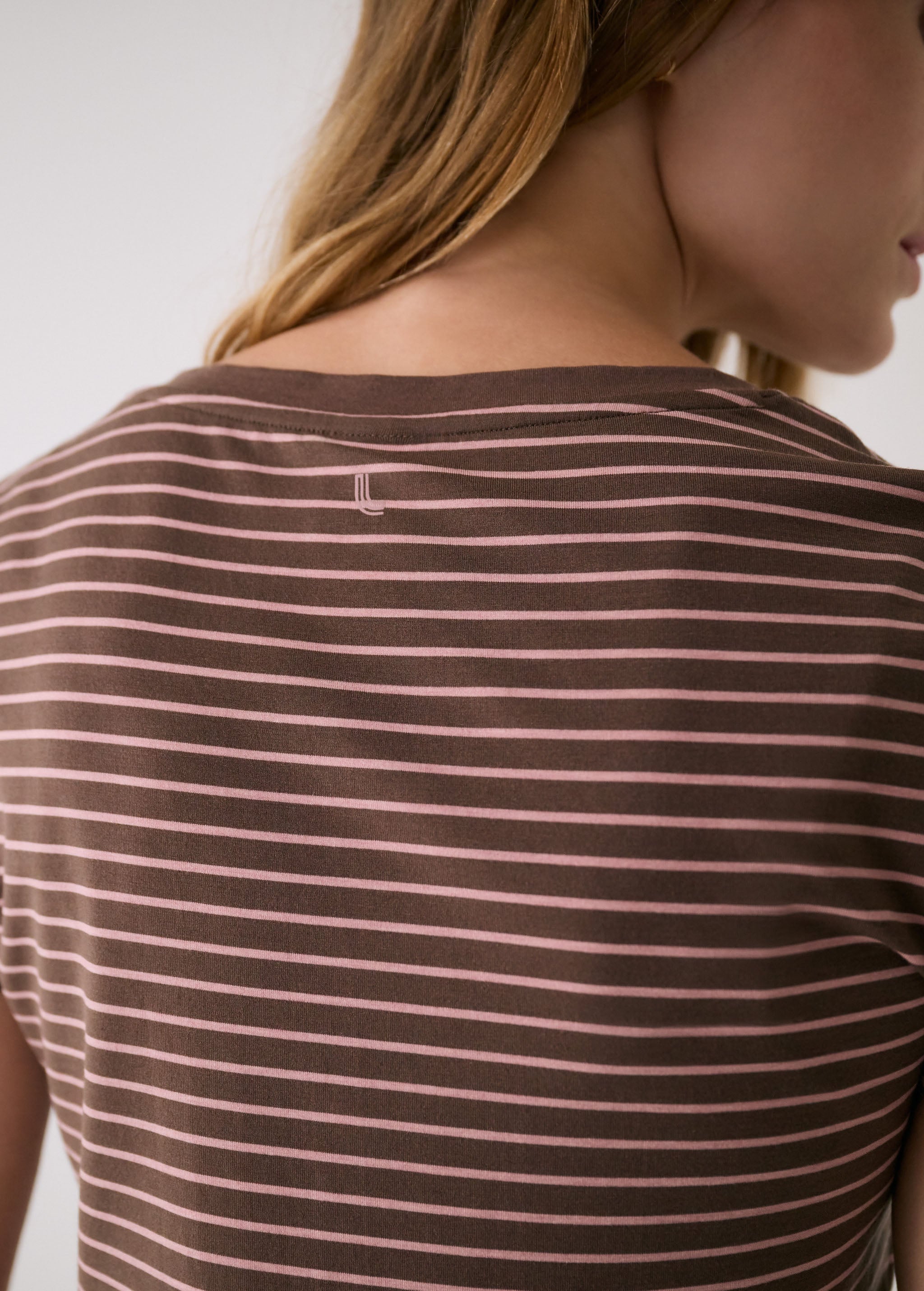 Lolë Dynamic V-neck in brown stripe — this V-neck tee proves that everyday essentials can still feel special