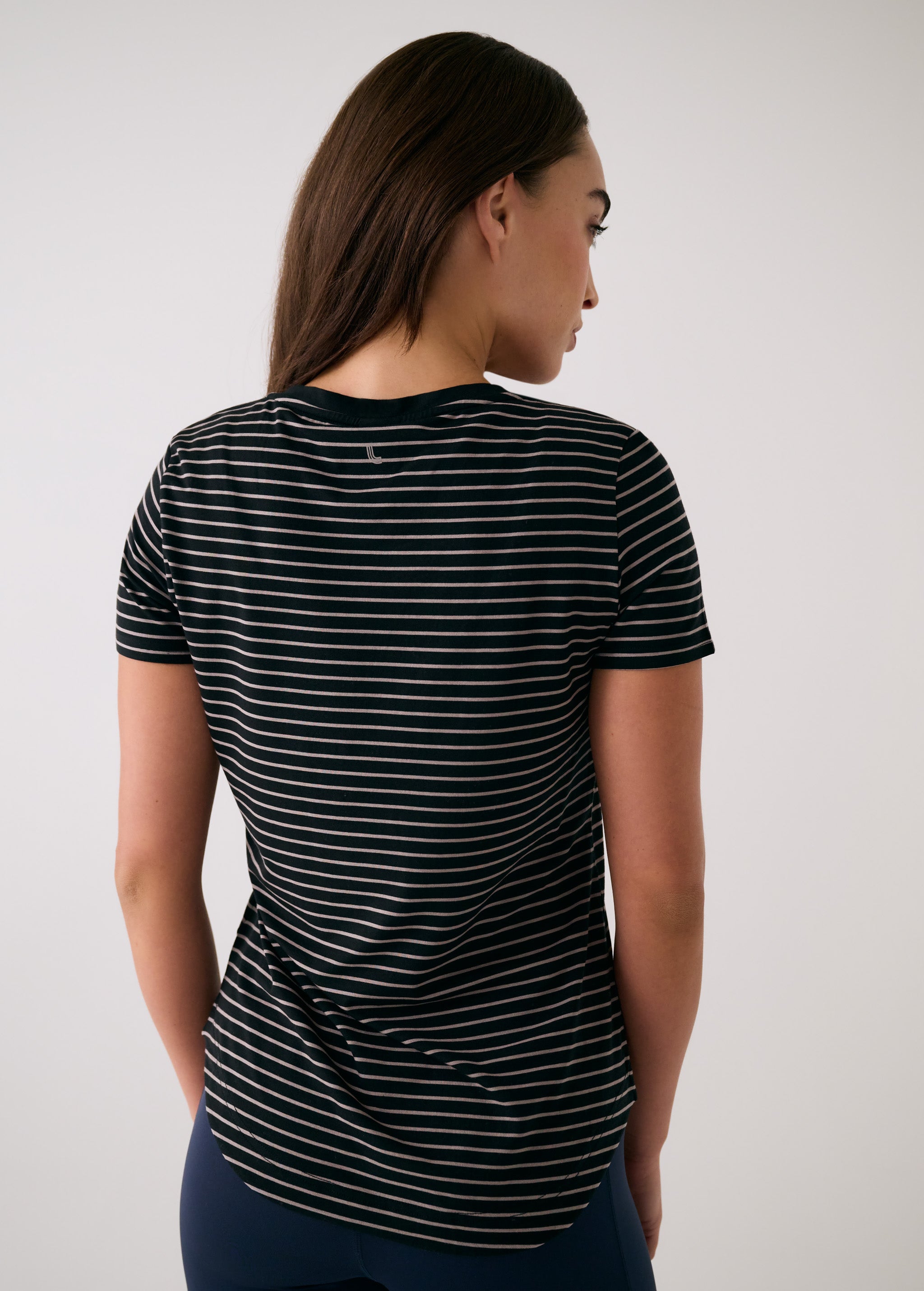 Lolë Dynamic V-neck in black — this V-neck tee proves that everyday essentials can still feel special