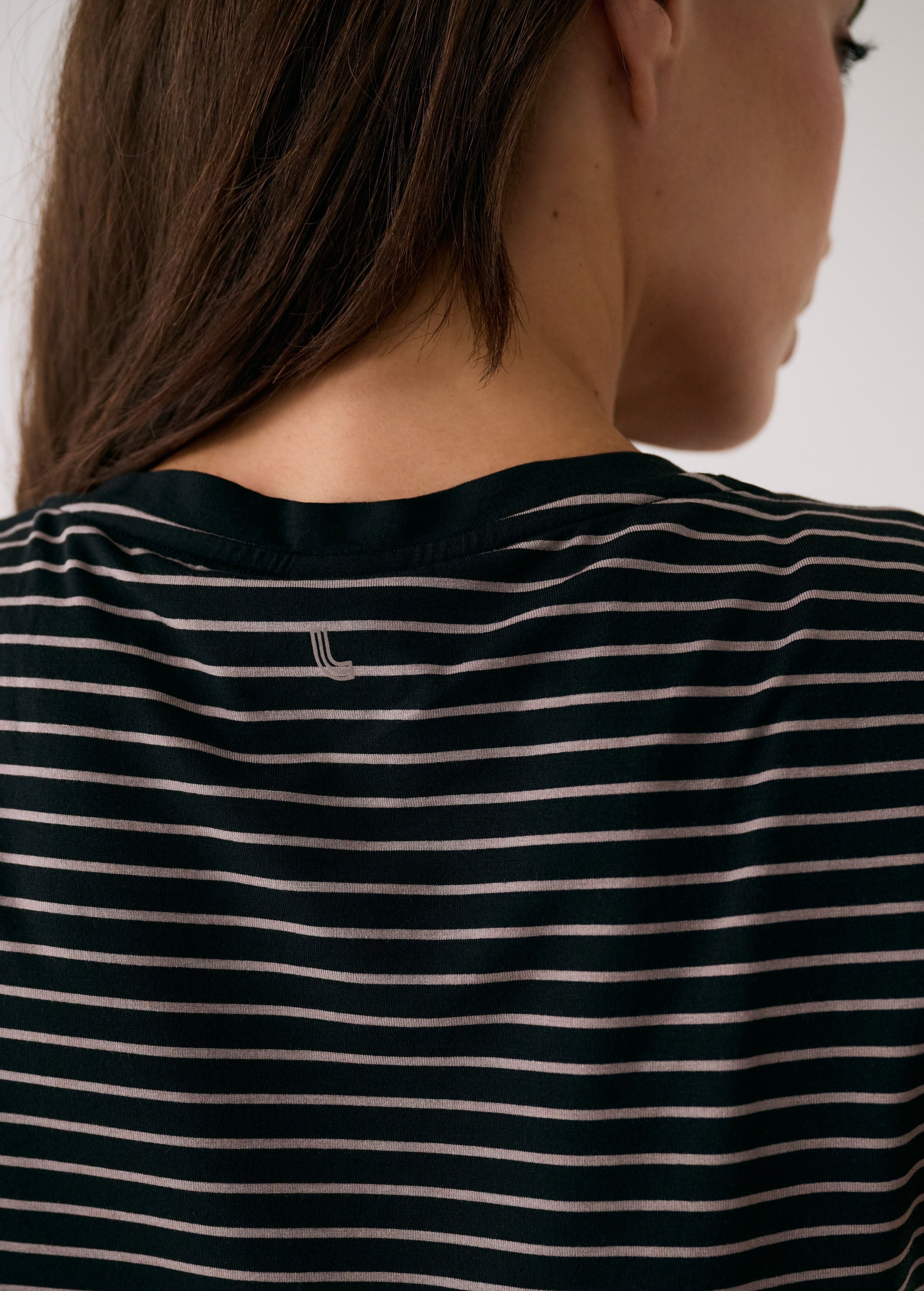 Lolë Dynamic V-neck in black — this V-neck tee proves that everyday essentials can still feel special