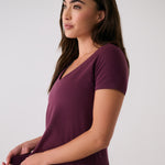 Lolë Dynamic V-neck in burgundy — this V-neck tee proves that everyday essentials can still feel special