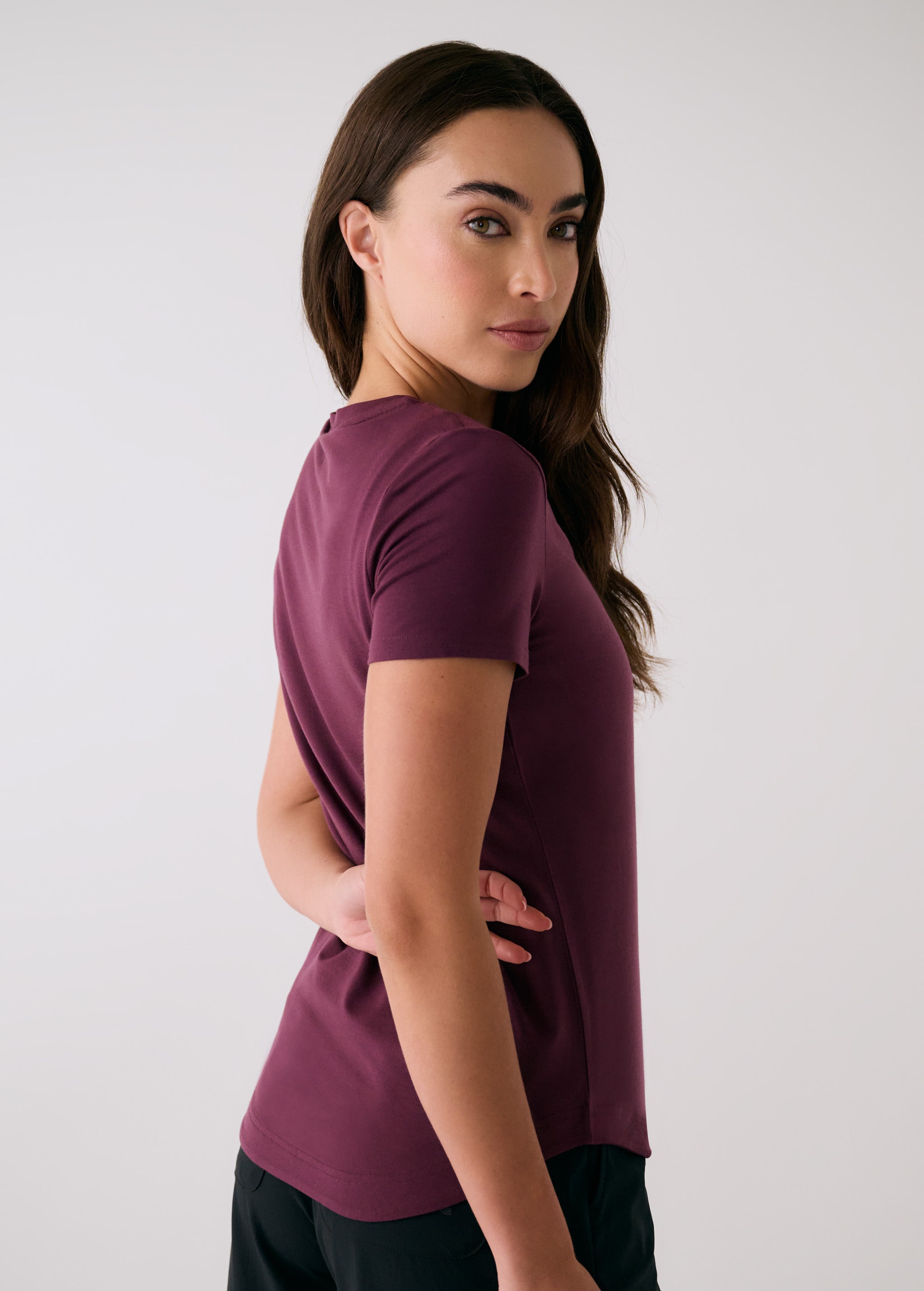 Lolë Dynamic V-neck in burgundy — this V-neck tee proves that everyday essentials can still feel special