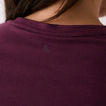 Lolë Dynamic V-neck in burgundy — this V-neck tee proves that everyday essentials can still feel special
