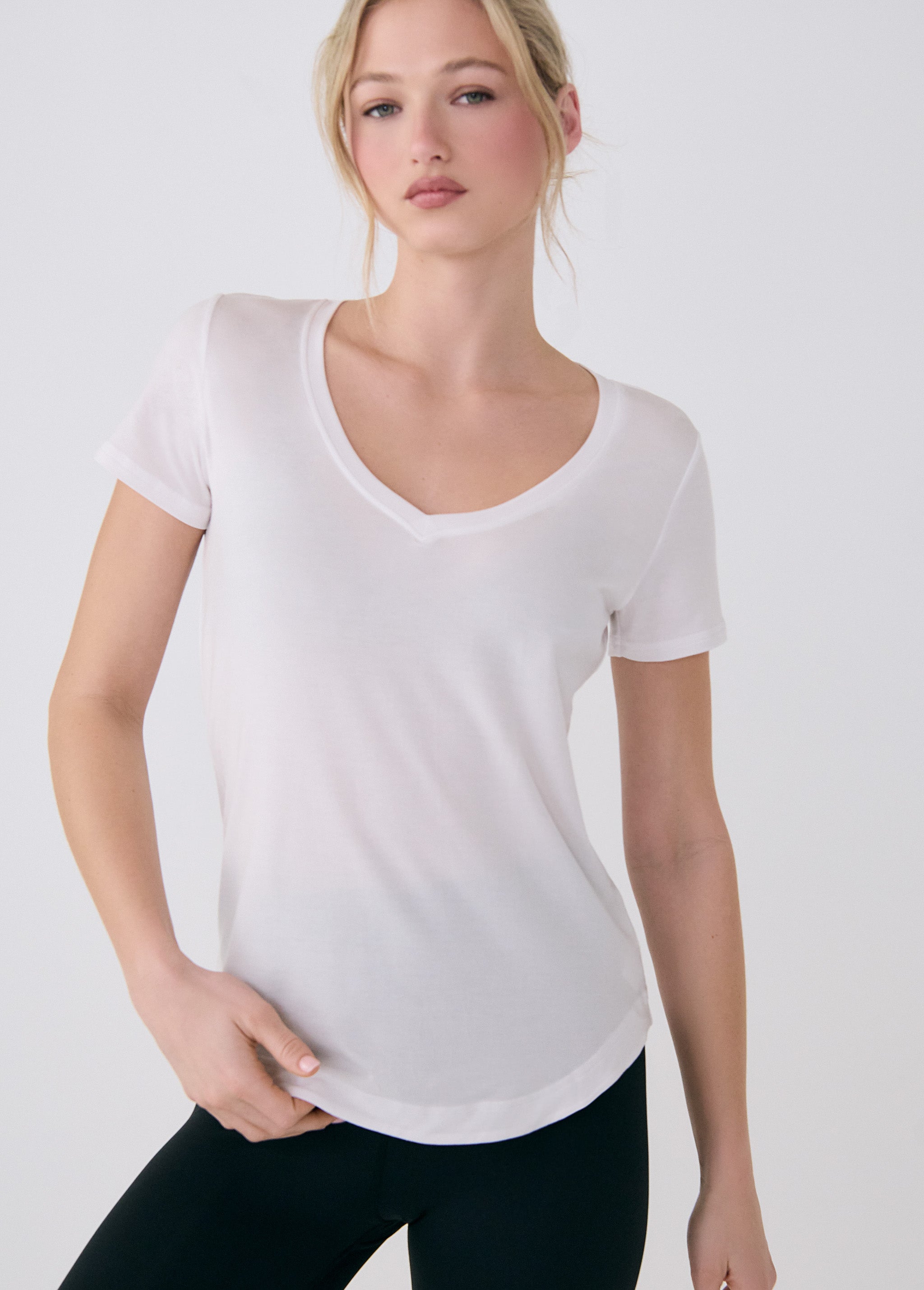Lolë Dynamic V-neck in white — this V-neck tee proves that everyday essentials can still feel special