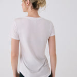 Lolë Dynamic V-neck in white — this V-neck tee proves that everyday essentials can still feel special